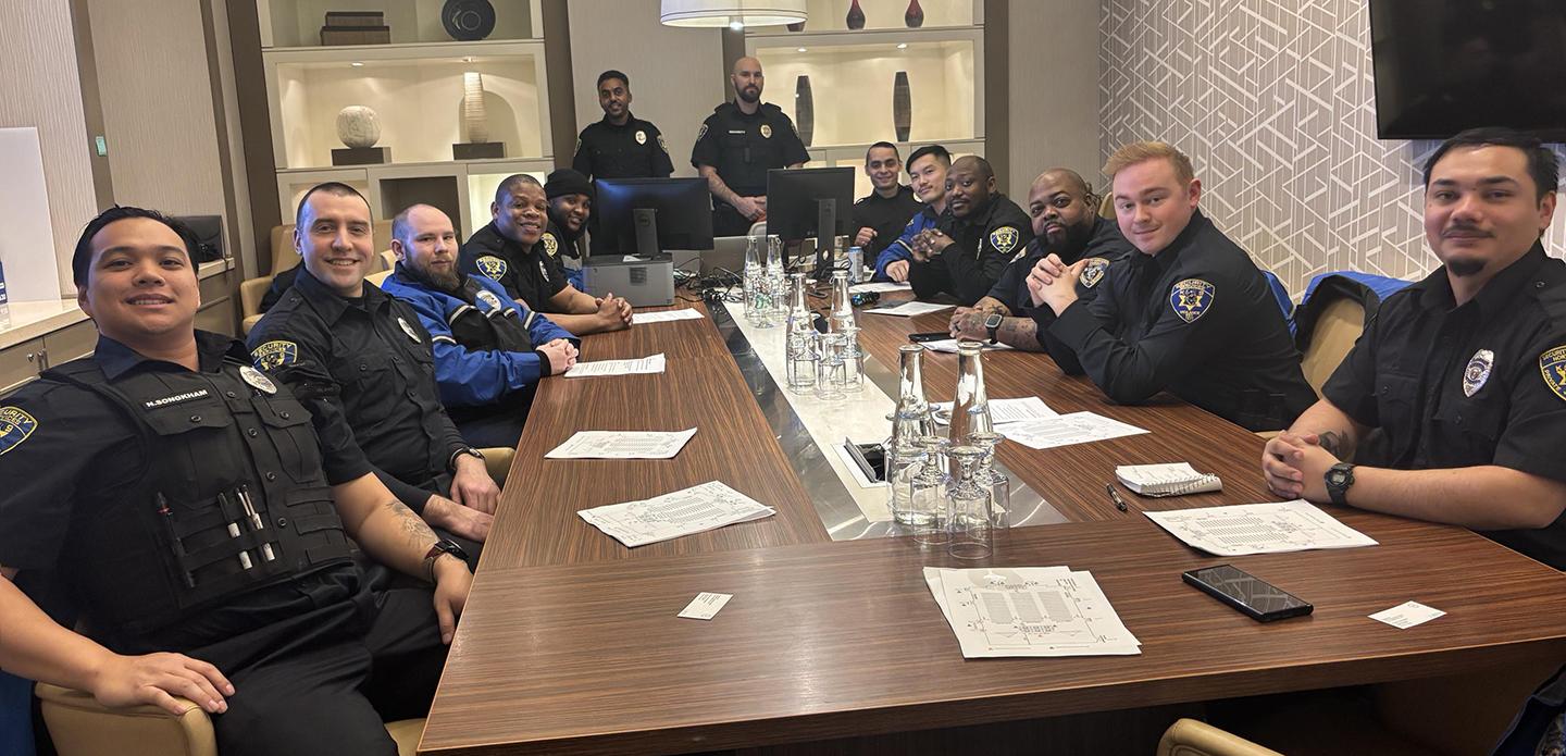 group of security officers sitting at table