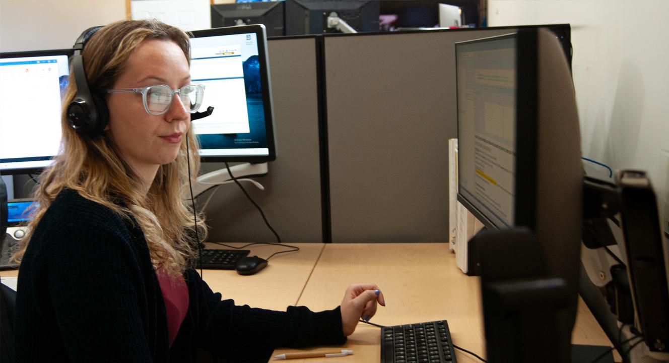 female dispatcher with headset