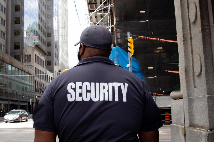 security officer patrolling city neighborhood