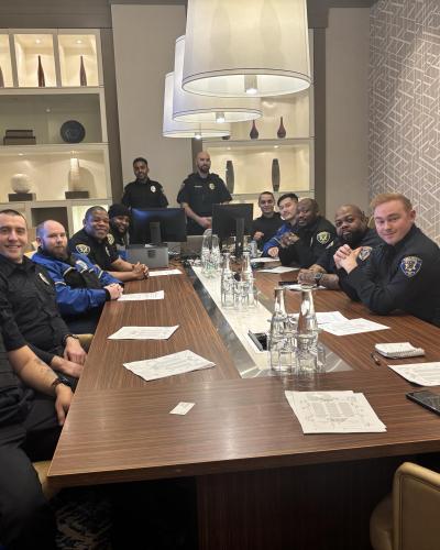 group of security officers sitting around table